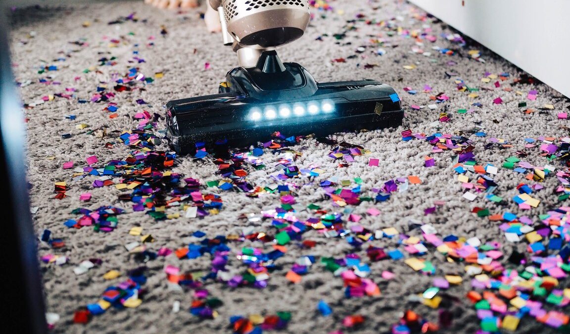 Maid cleaning a carpet