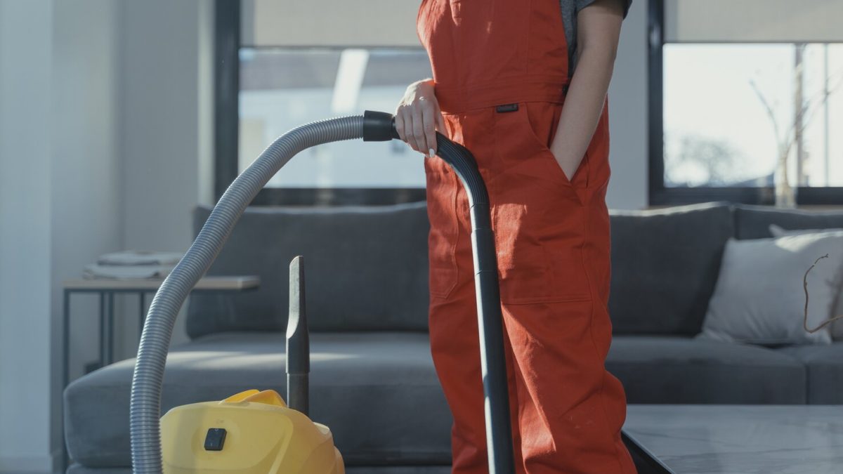 vacuuming a carpet