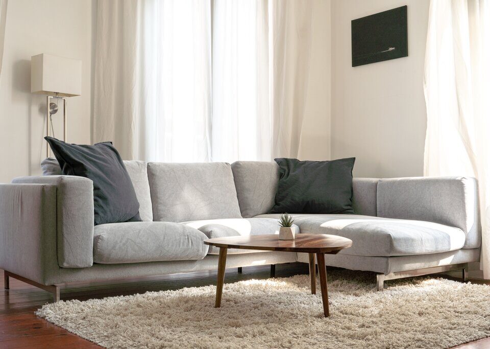 grey couch on in the living room