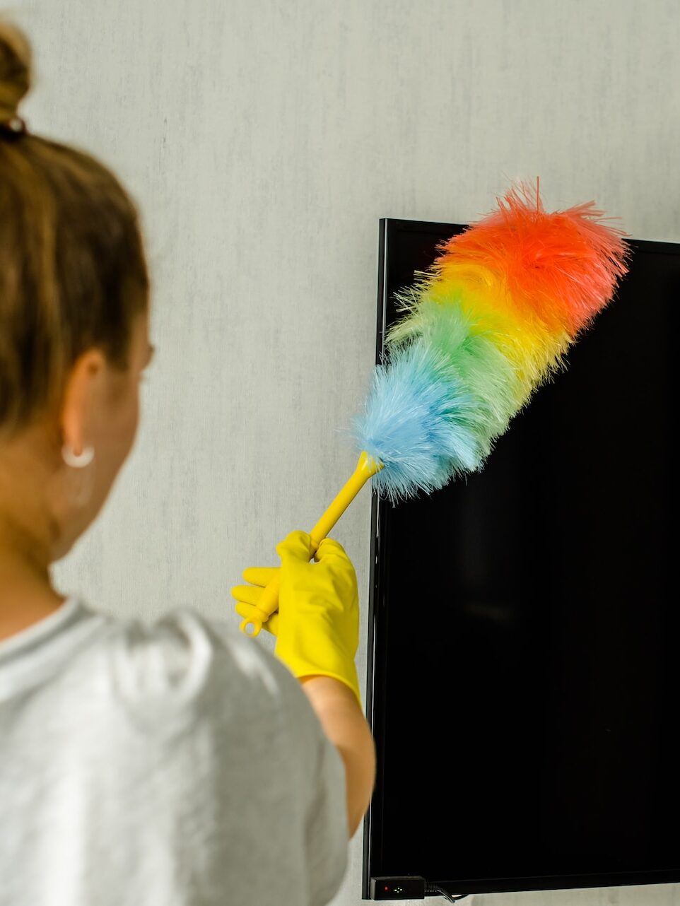 Diamond Cleaning image of a woman dusting the surface